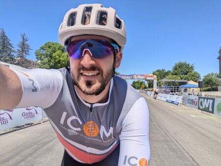 Student Doctor David Butler takes a selfie while riding his bike in the Boise Twilight Criterium on Saturday, June 29.